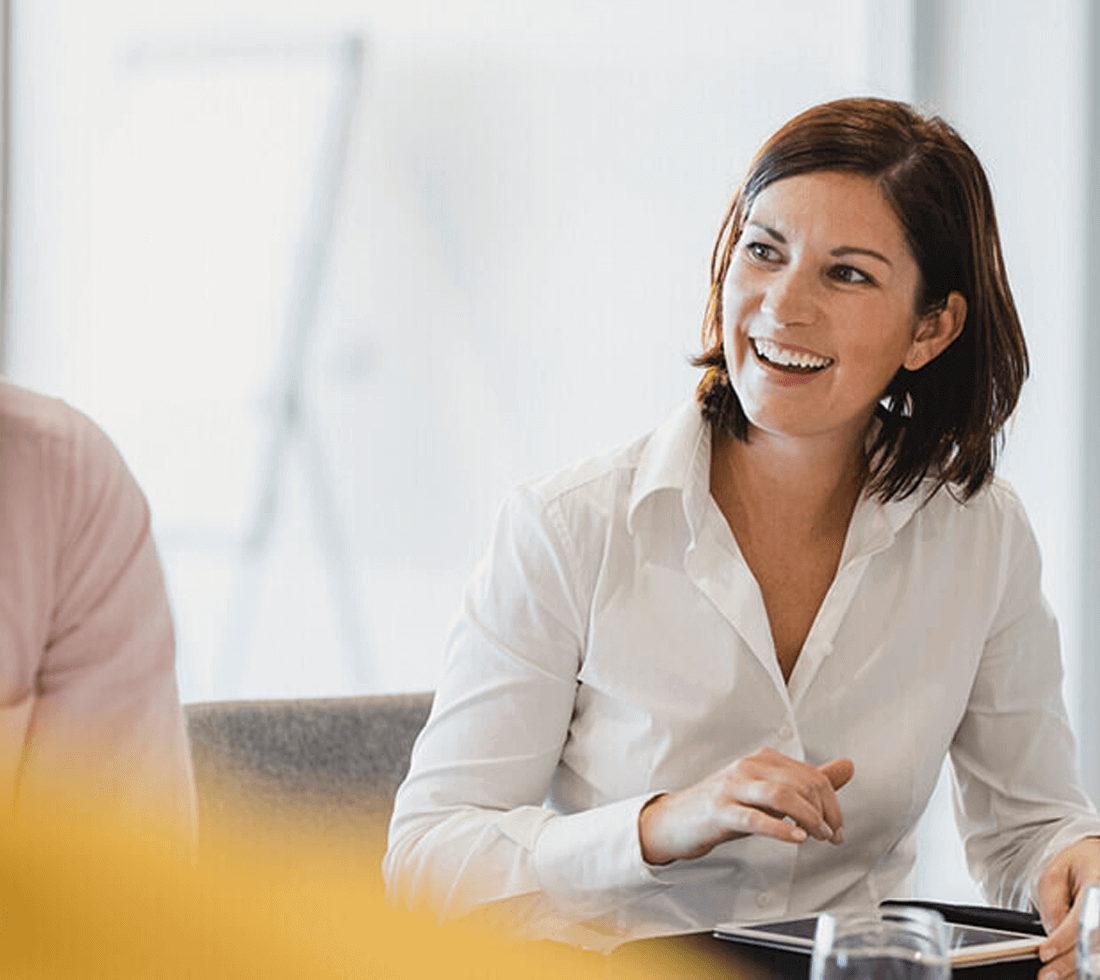 woman-smiling-at-work